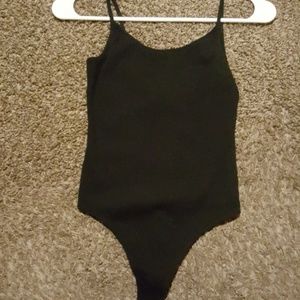 Black ribbed xs body suit . Worn once